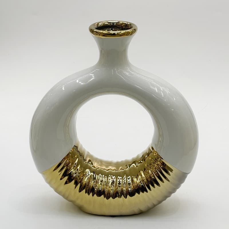 Single white and platinum ceramic loop vase with a rounded body