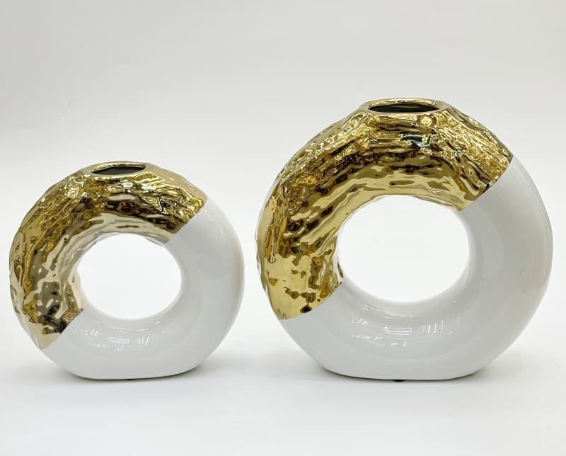 Pair of white ceramic loop vases with platinum textured edges