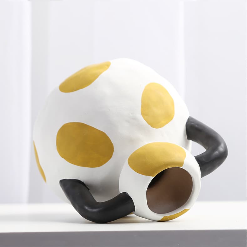 Cream milk pot ceramic vase displayed on its side