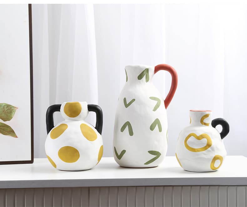 Cream milk pot ceramic vase trio on a shelf