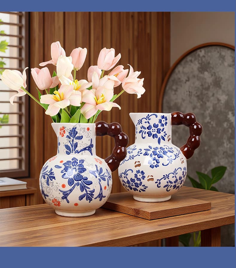 Blue porcelain vase pair styled with light flowers